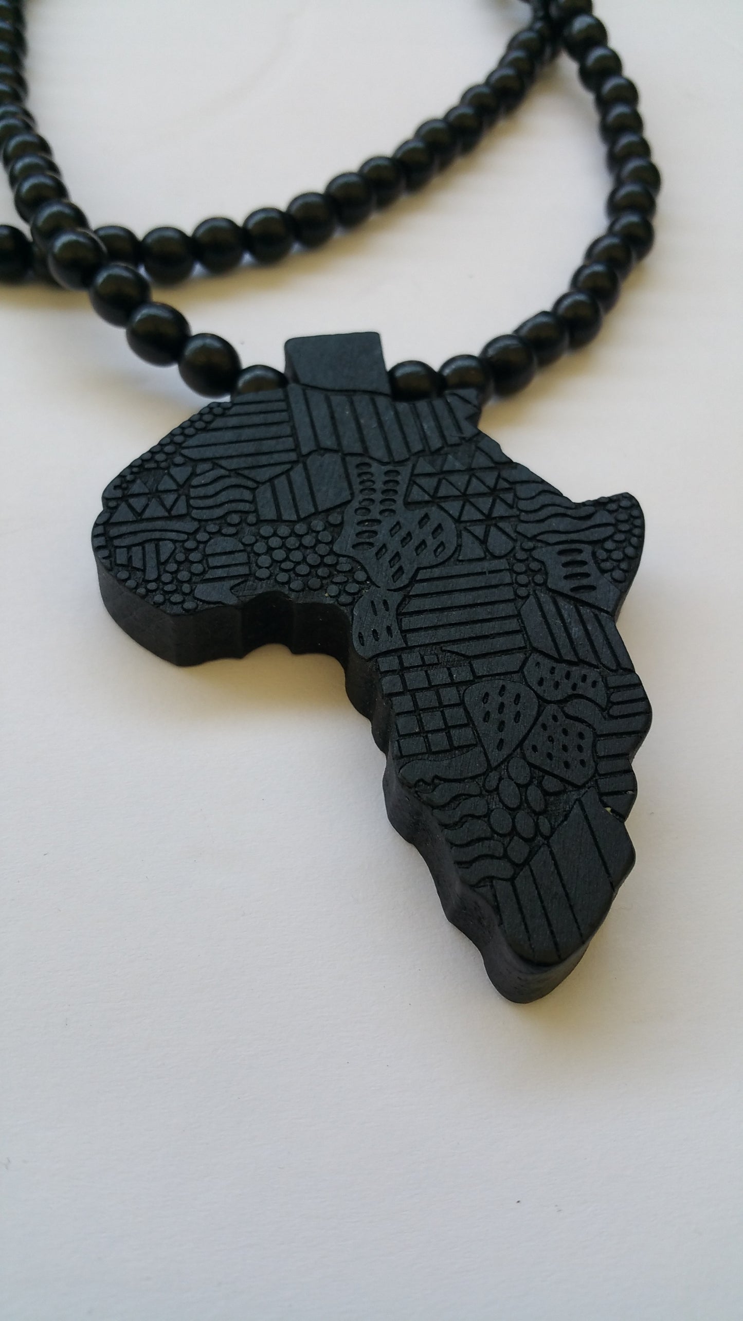31" African Wood Bead Laser Cut Medallion Necklace