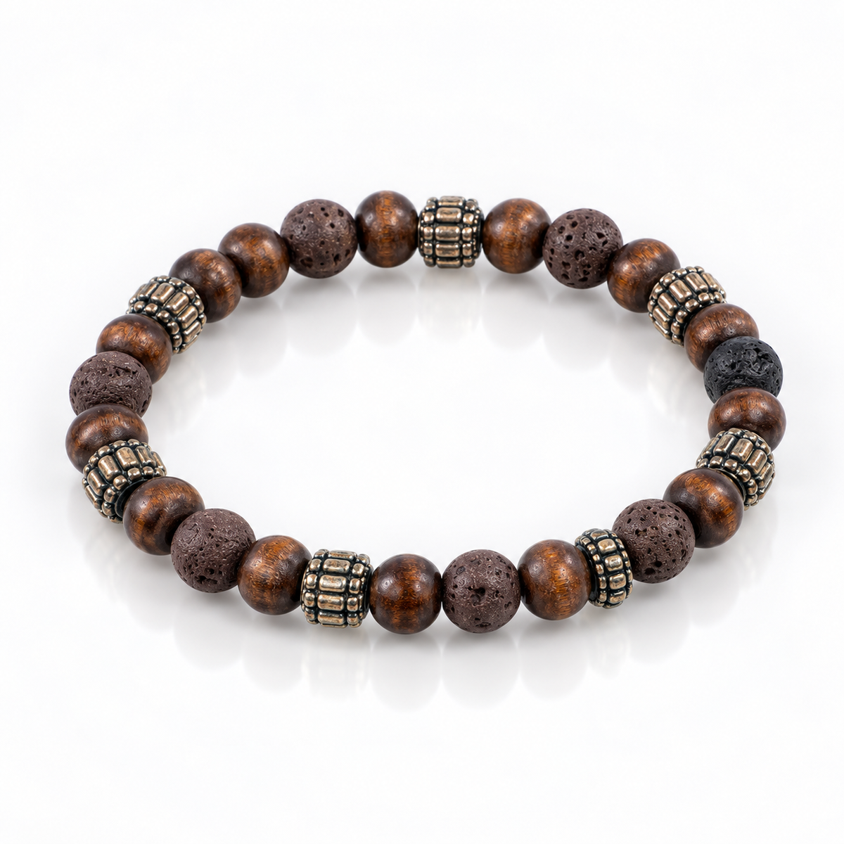 Angled view of brown lava stone and wood bead bracelet with patterned metallic barrel accents.