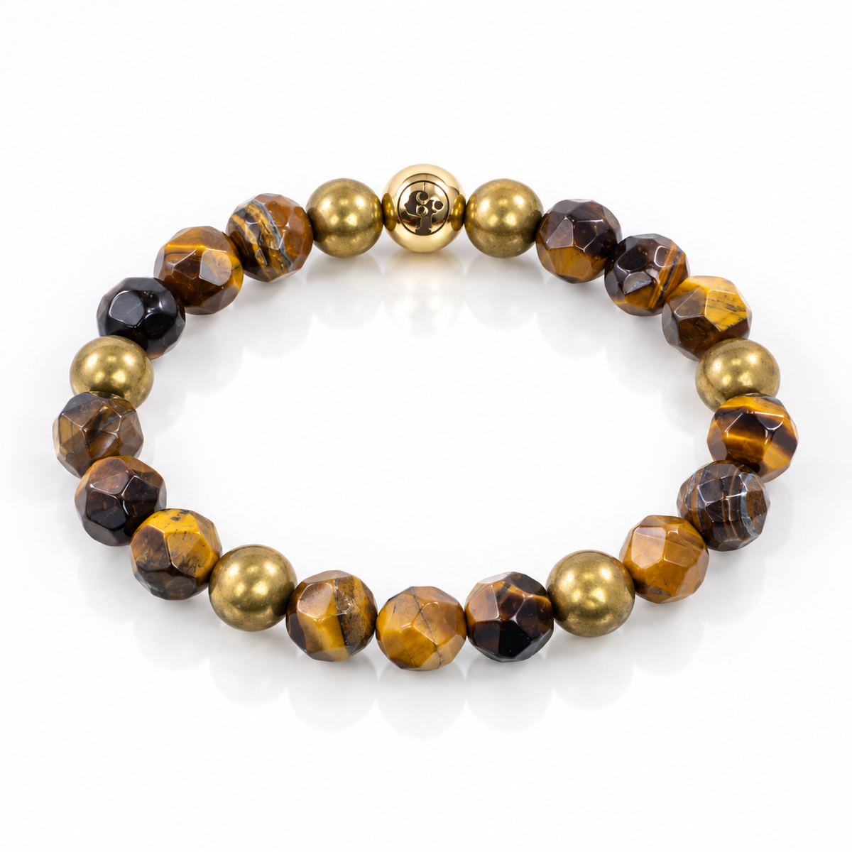 Angled view of faceted tiger’s eye beads with rounded gold-tone accents and a polished emblem bead.